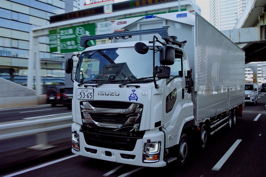 Isuzu autonomous truck with Applied Intuition sensor suite on a Japanese highway